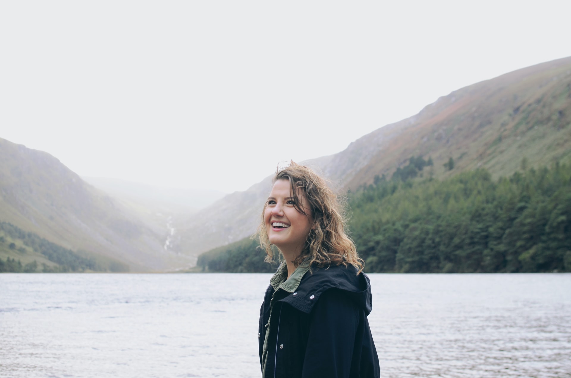 Woman smiling at Glendalough lakes